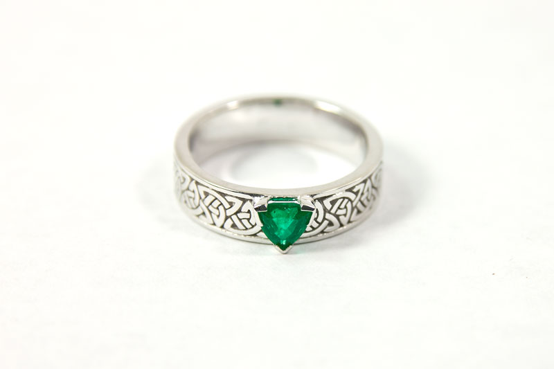 An Emerald and White Gold Engagement Ring